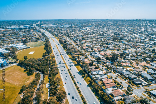 Cars driving on Monash Freeway at Wheelers Hill suburb in Melbourne, Australia - aerial view photo