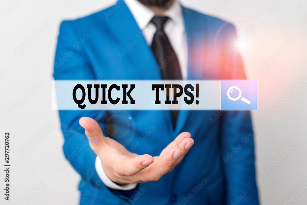 Writing note showing Quick Tips. Business concept for small but particularly useful piece of practical advice Man in front of table. Mobile phone and notes on the table Writing note showing Quick Tips. Business concept for small but particularly useful piece of practical advice Man in front of table. Mobile phone and notes on the table