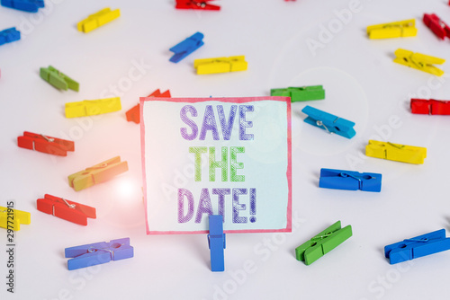 Word writing text Save The Date. Business photo showcasing reserve the mentioned future wedding date on their calendar Colored clothespin papers empty reminder white floor background office