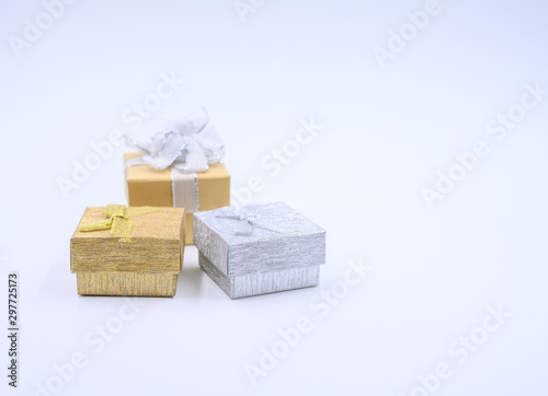 Gift box with copy space for christmas decorations on the white table background.