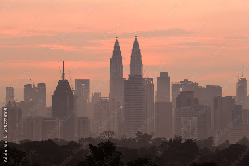 beautiful sunrise over kuala lumpur city skyline