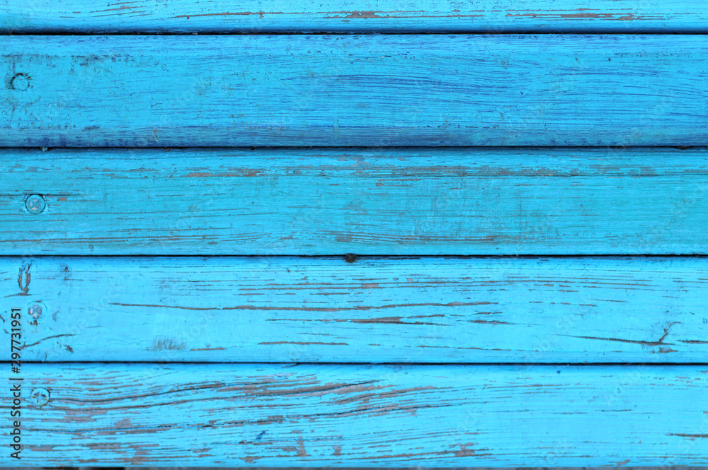 The surface of the nailed boards painted in blue. Background picture