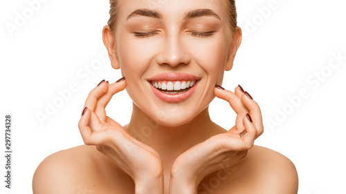 Close up portrait of a woman touching face. Isolated on white.