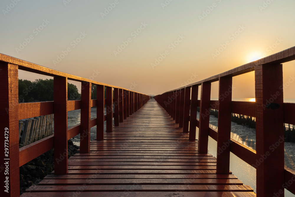 Red wooden bridge in the morning