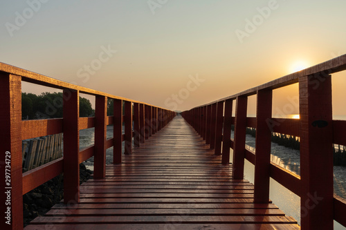 Red wooden bridge in the morning