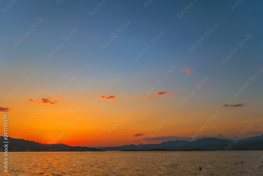 Seascape dawn over sea shore landscape paradise evening