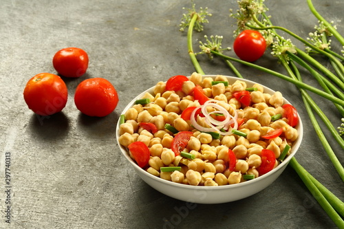 Healthy vegan diet salad with chickpeas and exotic herbs