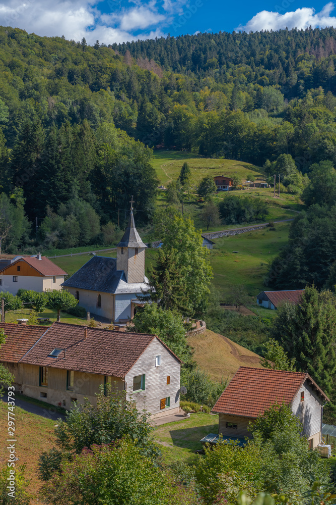 Château-Lambert, France - 09 13 2019: Hike in the circuit of school trail. The church