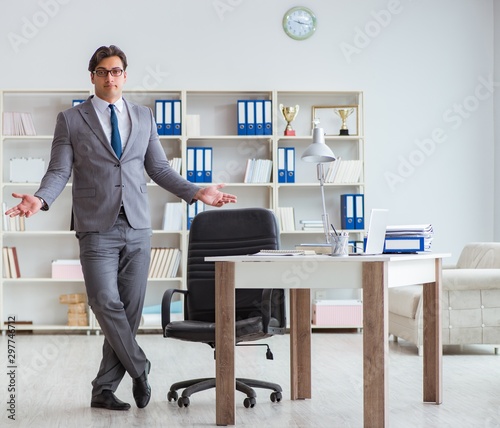 Businessman having fun taking a break in the office at work © Elnur