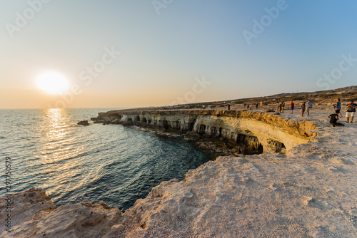 View of rocks with sea caves at sunset on Cape Greco near Ayia NAPA  Cyprus.