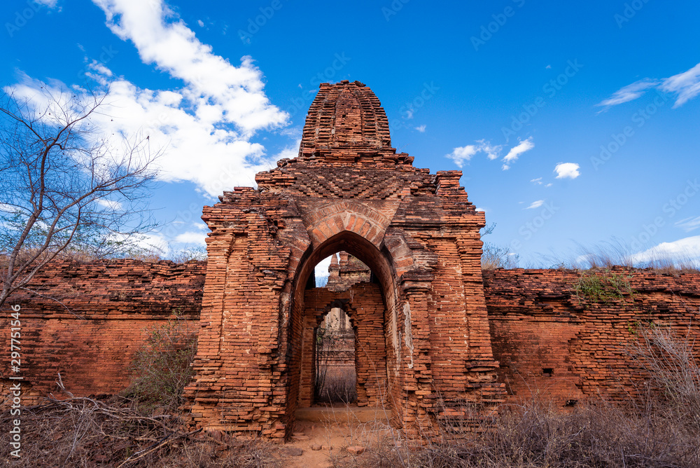 Ancient temple and pagoda in Bagan ,Myammar .This show Archaeological place of Myammar with blue cloud sky background.