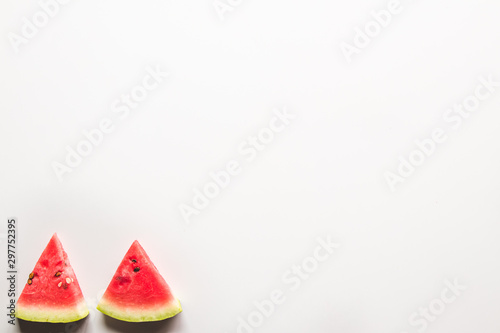 Slice of ripe and juicy watermelon , isolated on white. Top view.