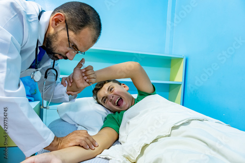 Doctor treating patient with needle