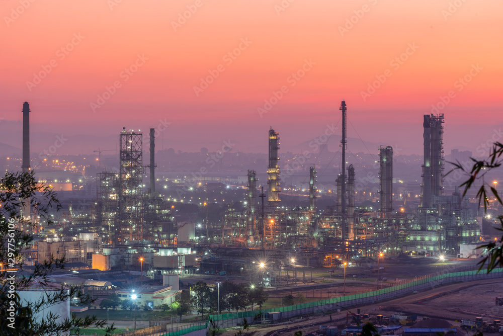 Landscape of Oil and Gas Refinery Manufacturing Plant., Petrochemical or Chemical Distillation Process Buildings., Factory of Power and Energy Industrial at Twilight Sunset., Engineering Petroleum.