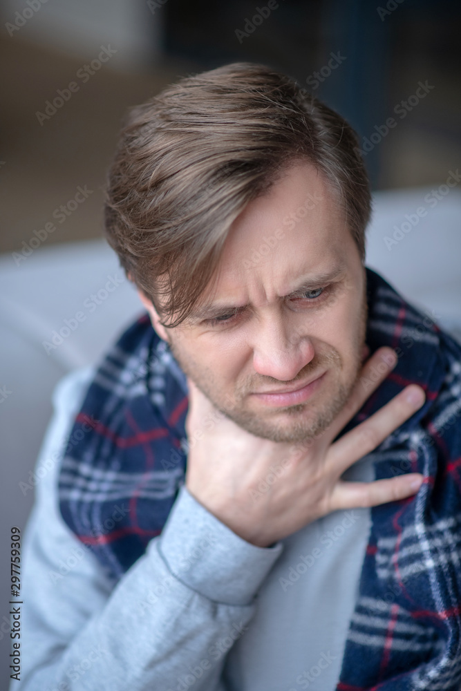 Man feeling terrible bad after catching seasonal cold