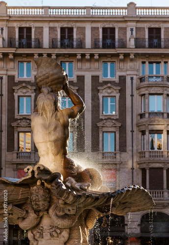 Rome, Baroque style Triton Fountain in Piazza Barberini. Italy photo