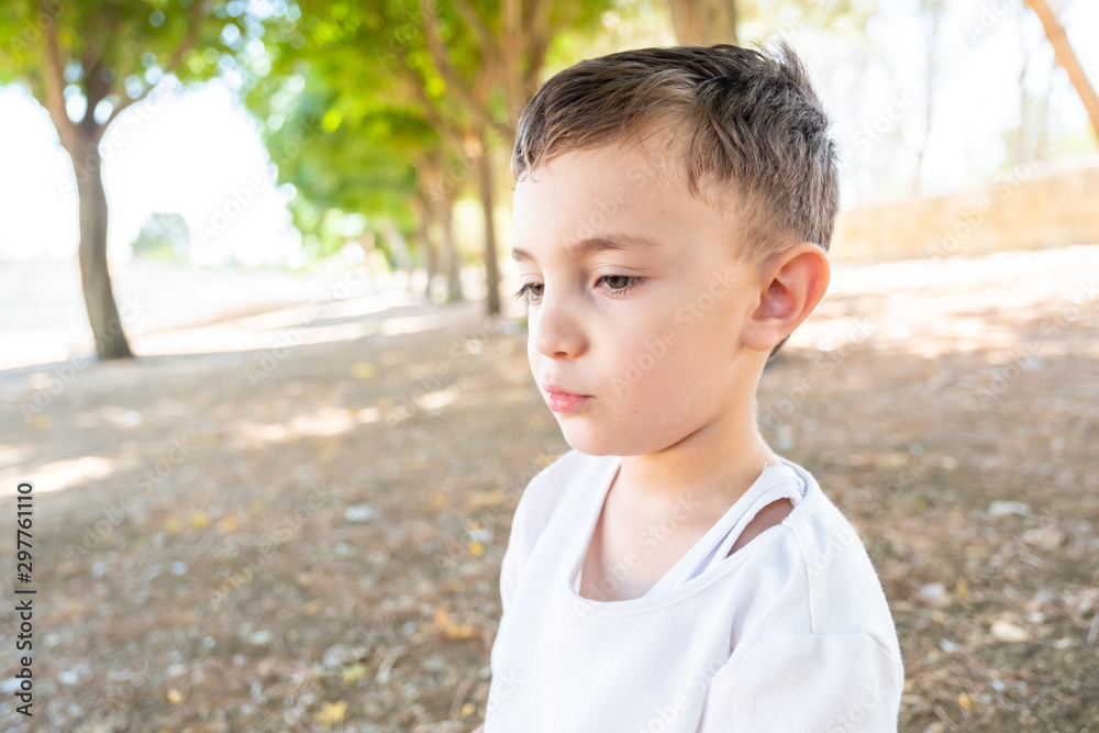 Happy muslim arabic boy playing in hte park Happy muslim arabic boy playing in hte park