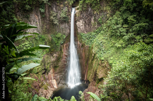 Fototapeta Naklejka Na Ścianę i Meble -  Catarata del Toro, waterfall in Costa Rica in the province of Alajuela, close to San Jose. Smooth waterfall image with ND filter and slow shutter speed. 