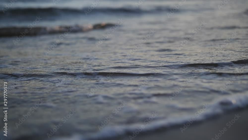 close up of man feet leaving marks on the sand on the sea, travel concept close up of man feet leaving marks on the sand on the sea, travel concept