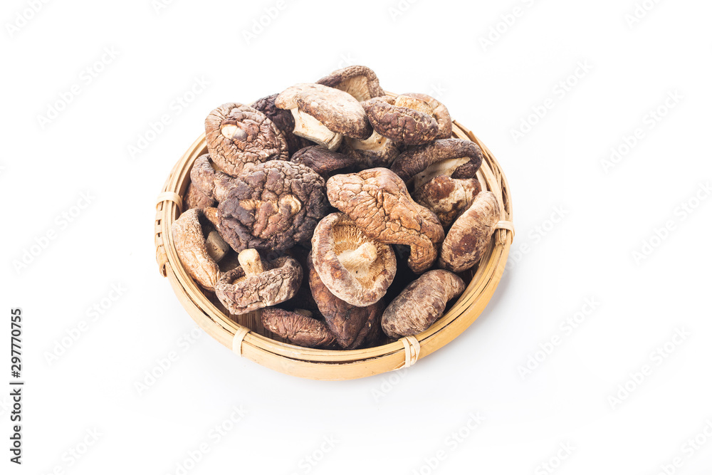 Dried shiitake mushrooms on a white background Dried shiitake mushrooms on a white background