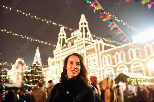 girl on the background of a Christmas castle