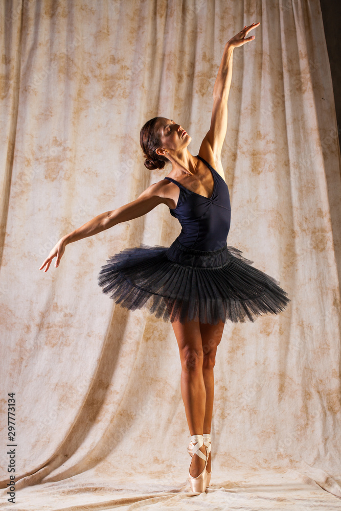 Full Body Portrait Russian Ballerina In A Black Dancing Suit Is Posing