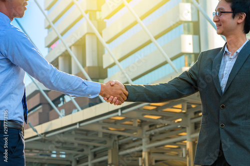 Business partnerchip concept. Two Business man making handshake photo