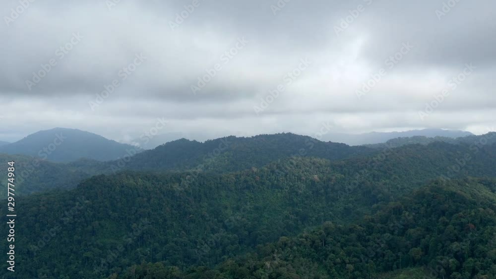Hyperlapse video of rain clouds forming above mountain forest. (Aerial time lapse) Hyperlapse video of rain clouds forming above mountain forest. (Aerial time lapse)