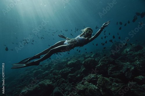 girl dives underwater © elovich