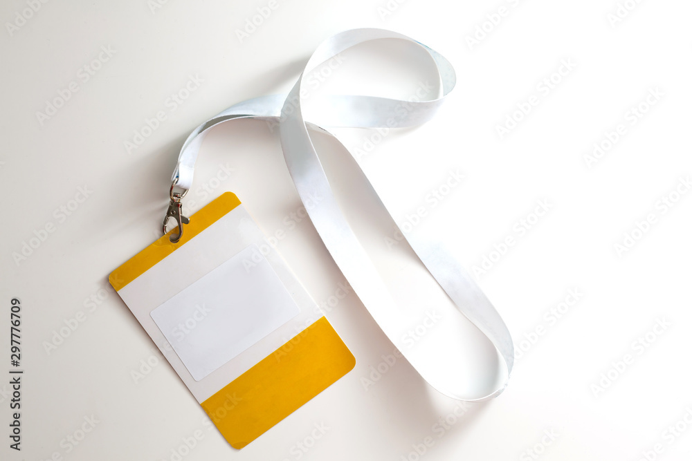 Blank bagde mockup isolated on white background. Nametag with white ribbon and transparent plastic paper holder. - obrazy, fototapety, plakaty 