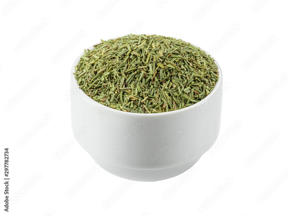 Chopped rosemary in a bowl isolated on white background with copy space for text or images. Spices and herbs. Packaging concept. Close-up.