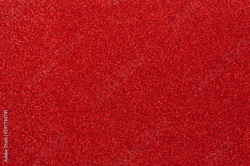 Red glitter texture. top view