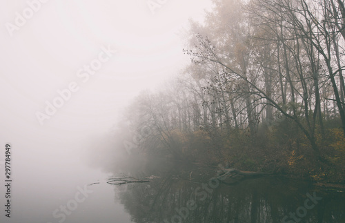 The thick fog over the lake in the morning