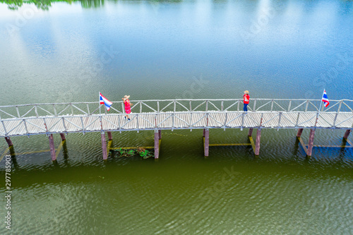Aerial view of wood bridge cross the river and blusky with cloud in Chumphon province. photo