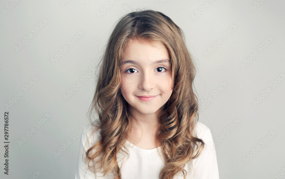 Child girl portrait,caucasian beautiful kid with long hair closeup.