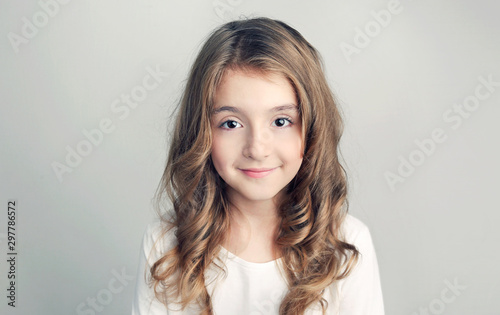 Child girl portrait,caucasian beautiful kid with long hair closeup.
