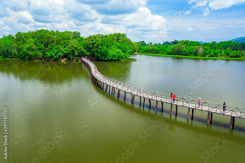 Aerial view of wood bridge cross the river and blusky with cloud in Chumphon province. photo