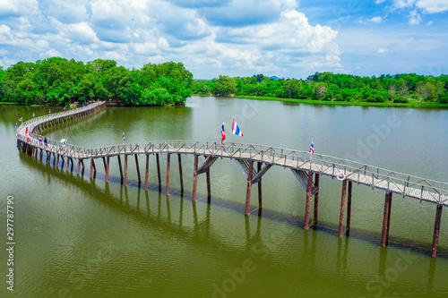 Aerial view of wood bridge cross the river and blusky with cloud in Chumphon province.
