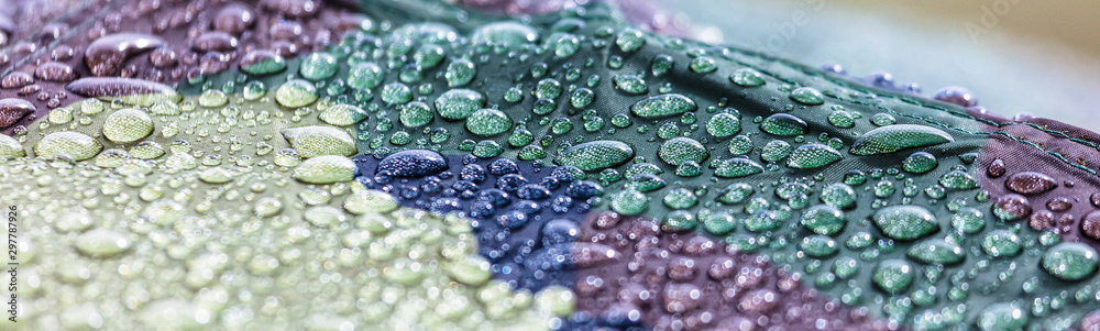 Raindrops on khaki color tent as abstract background Raindrops on khaki color tent as abstract background