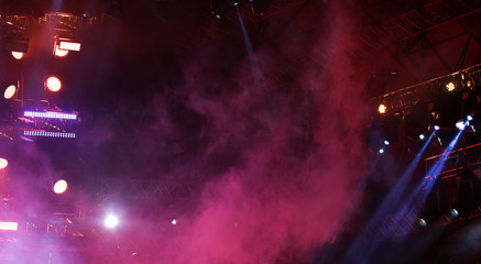 Purple light on a rock concert stage as background