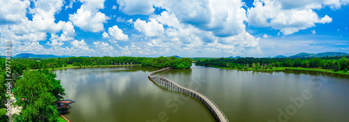 Aerial view of wood bridge cross the river and blusky with cloud in Chumphon province. photo