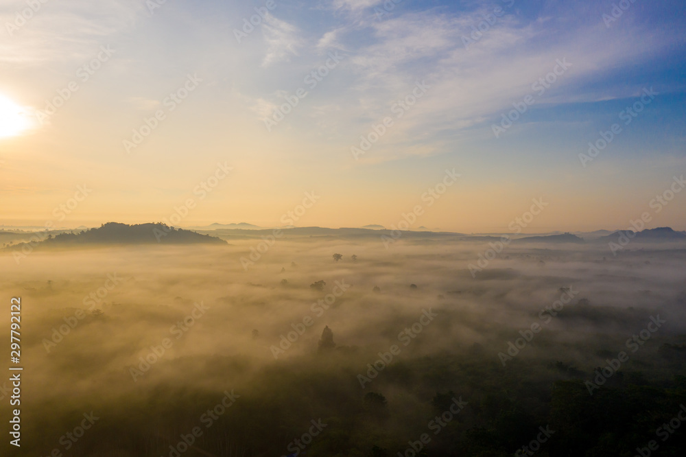 Morning sunrise with cloud over mountain in Surat Thani province, Thailand Morning sunrise with cloud over mountain in Surat Thani province, Thailand