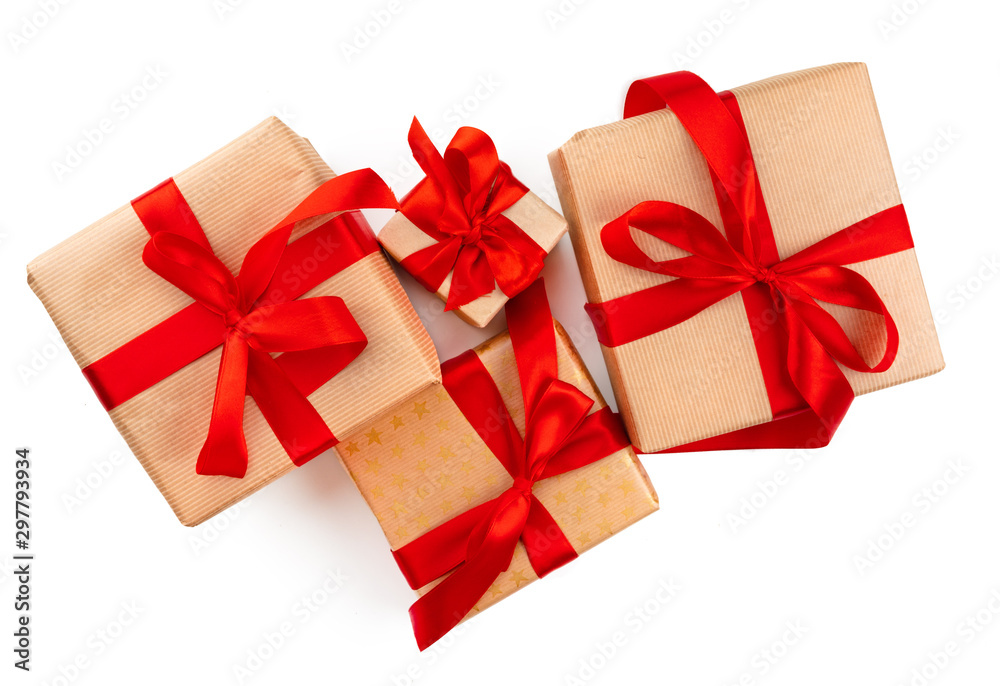 Craft christmas gifts with red bows isolated on white background, top view Craft christmas gifts with red bows isolated on white background, top view