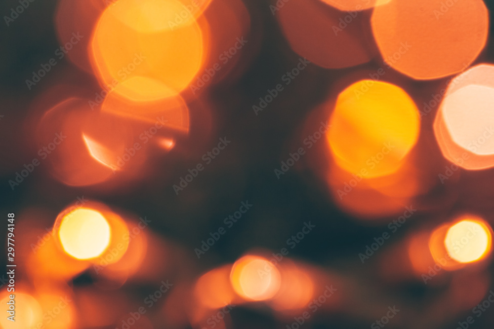 Abstract Gold bokeh sparkle on dark background Abstract Gold bokeh sparkle on dark background