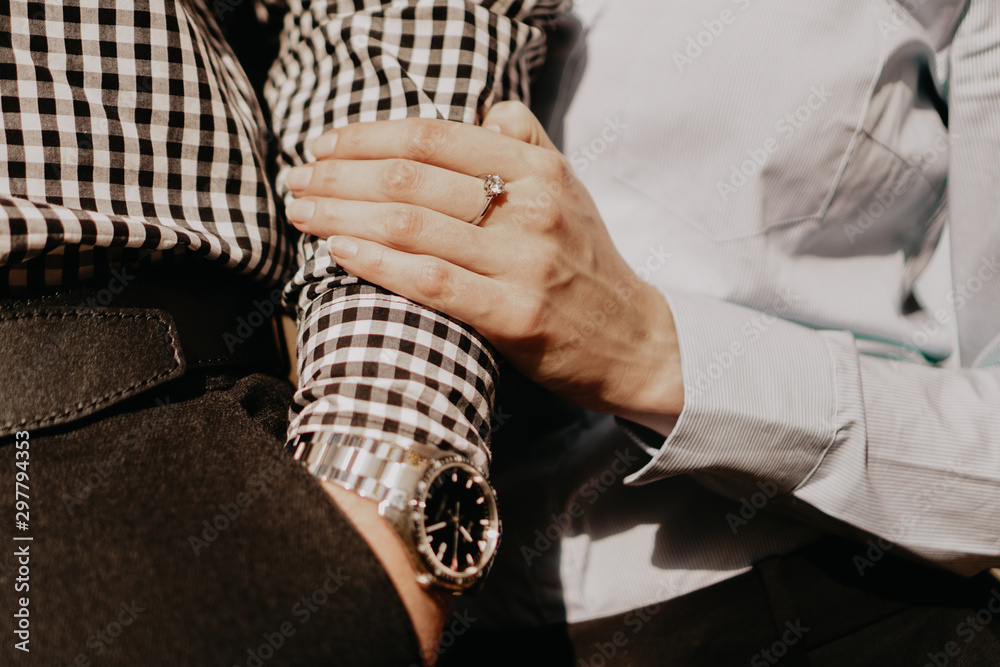 Couple watch shop hands
