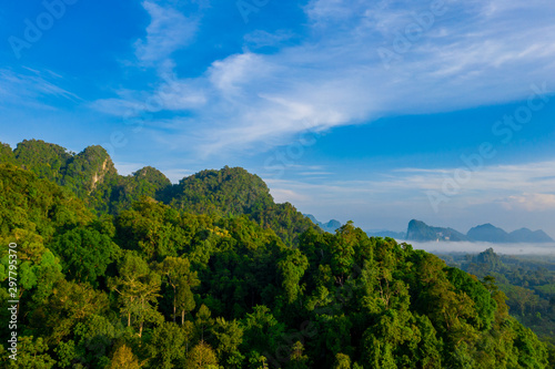 Aerial view of mountains with cloud cover mountain at sunrise and blue sky in Surat Thani Province  Thailand.