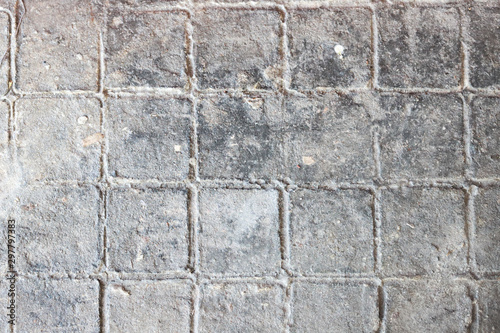 Gray brick arranged in same pattern - diagonal view.