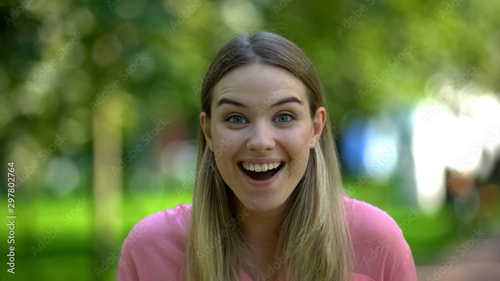 Excited young woman looking camera, good news amazement, lottery winner, luck Excited young woman looking camera, good news amazement, lottery winner, luck