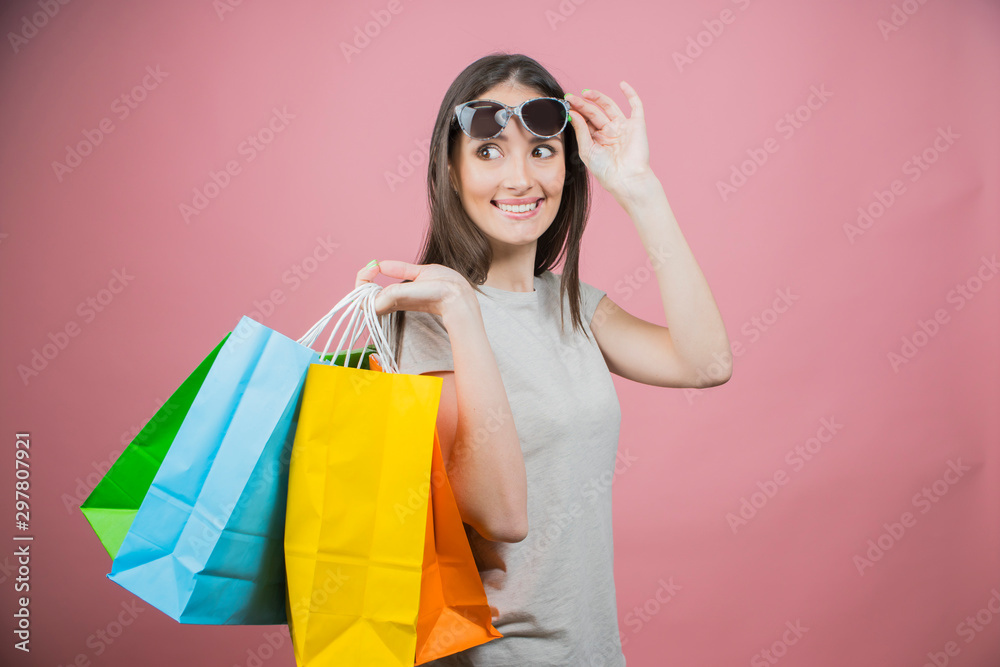 beautiful girl holding shopping bags