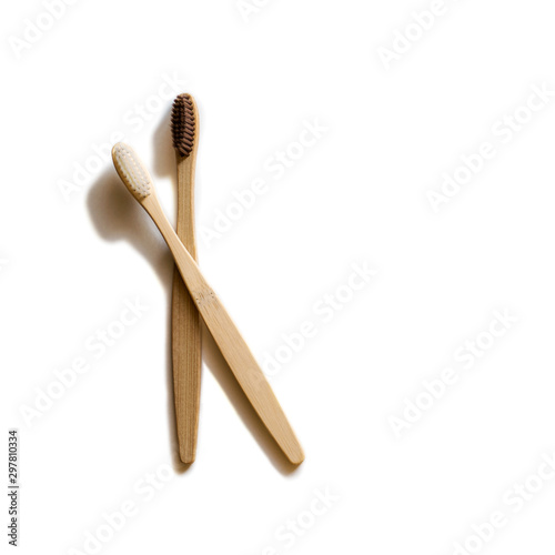 Two bamboo toothbrush isolated on white background. Zero waste concept.